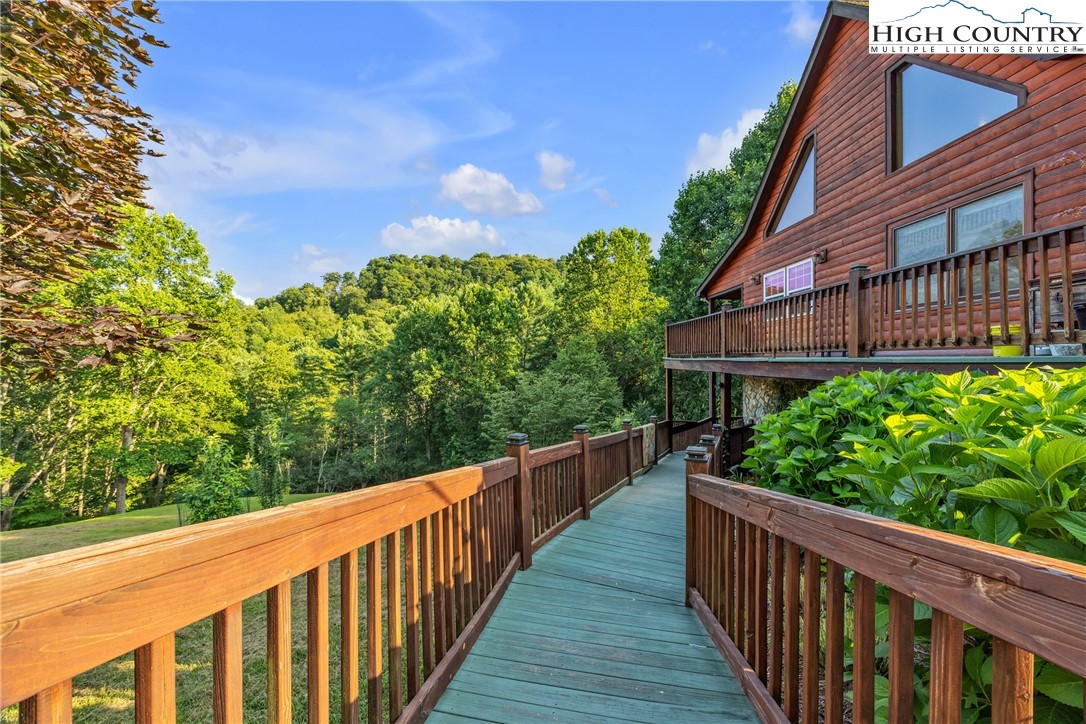 98 New Ridge Lane Piney Creek, NC 28663 - Photo 38 of 50 a balcony with an outdoor space