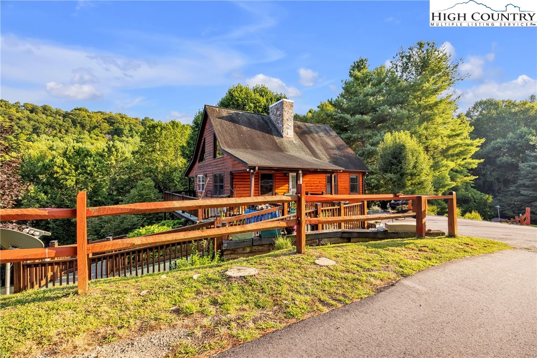 98 New Ridge Lane Piney Creek, NC 28663 - Photo 45 of 50 a view of a swimming pool with a patio