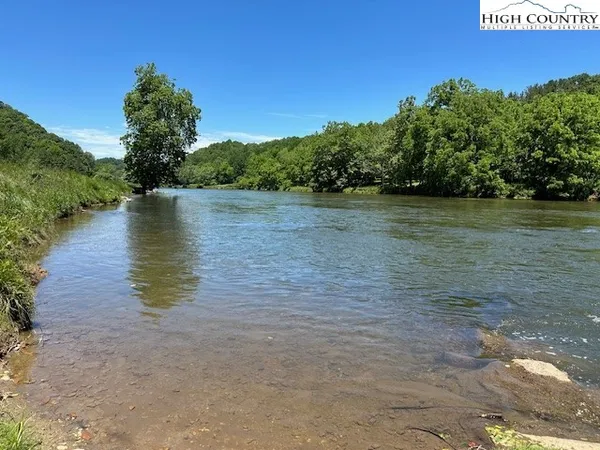 a view of ocean with mountains