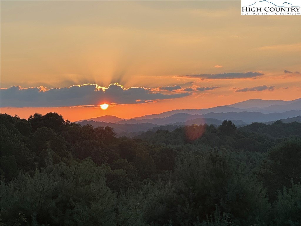 98 New Ridge Lane Piney Creek, NC 28663 - Photo 49 of 50 a view of ocean with mountains
