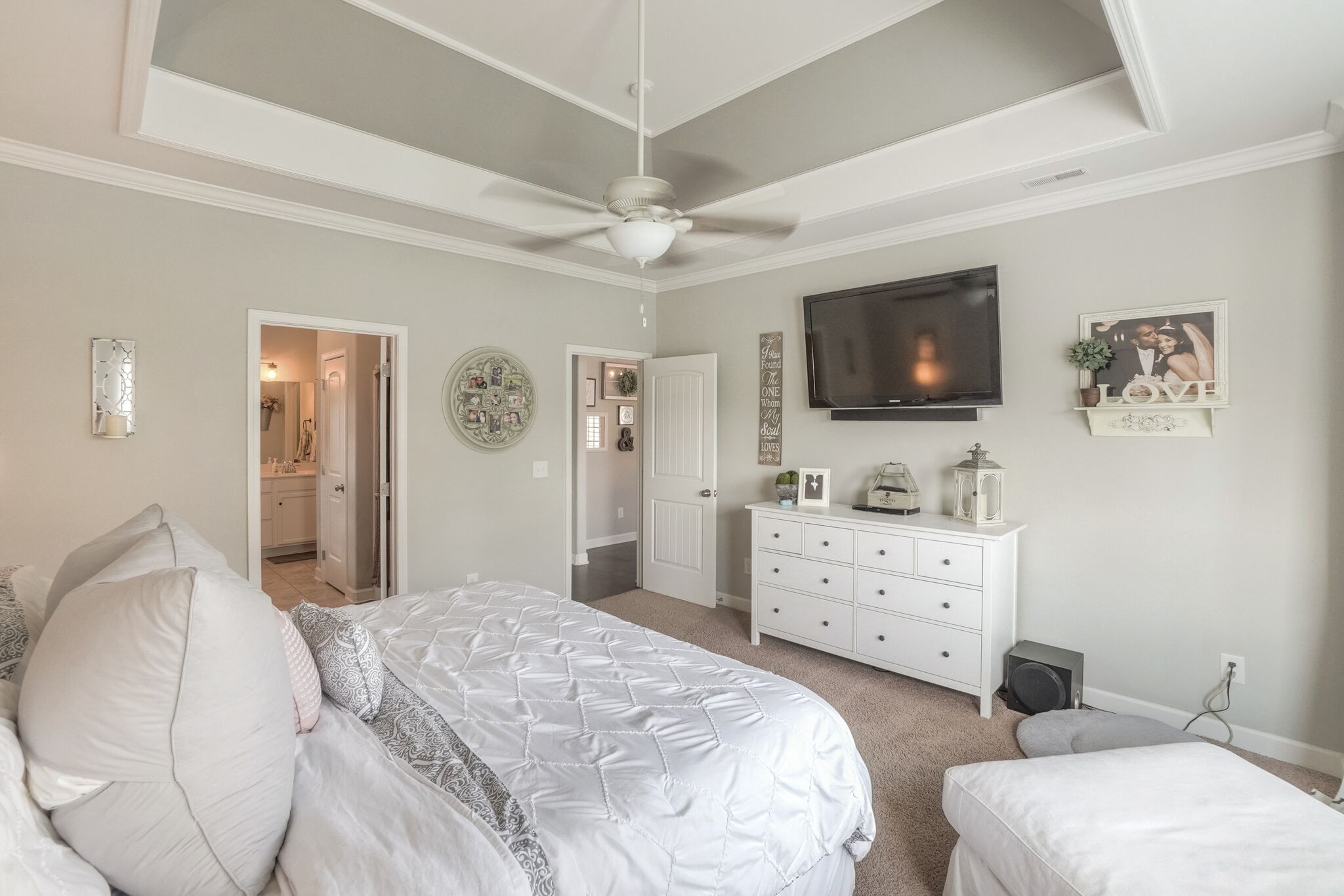 1057 Golf View Way Spring Hill, TN 37174 - Photo 14 of 29 a bedroom with a bed and a flat screen tv