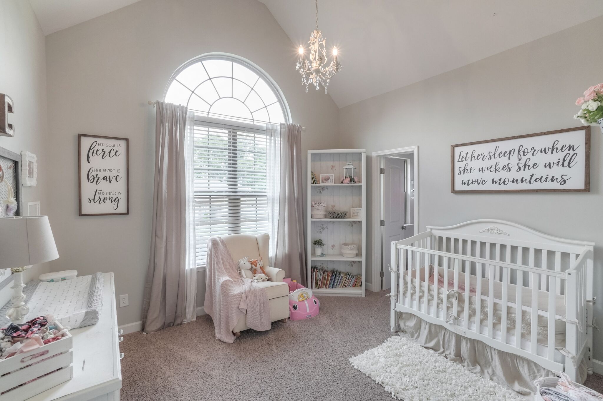 1057 Golf View Way Spring Hill, TN 37174 - Photo 19 of 29 a bedroom with furniture and a large window