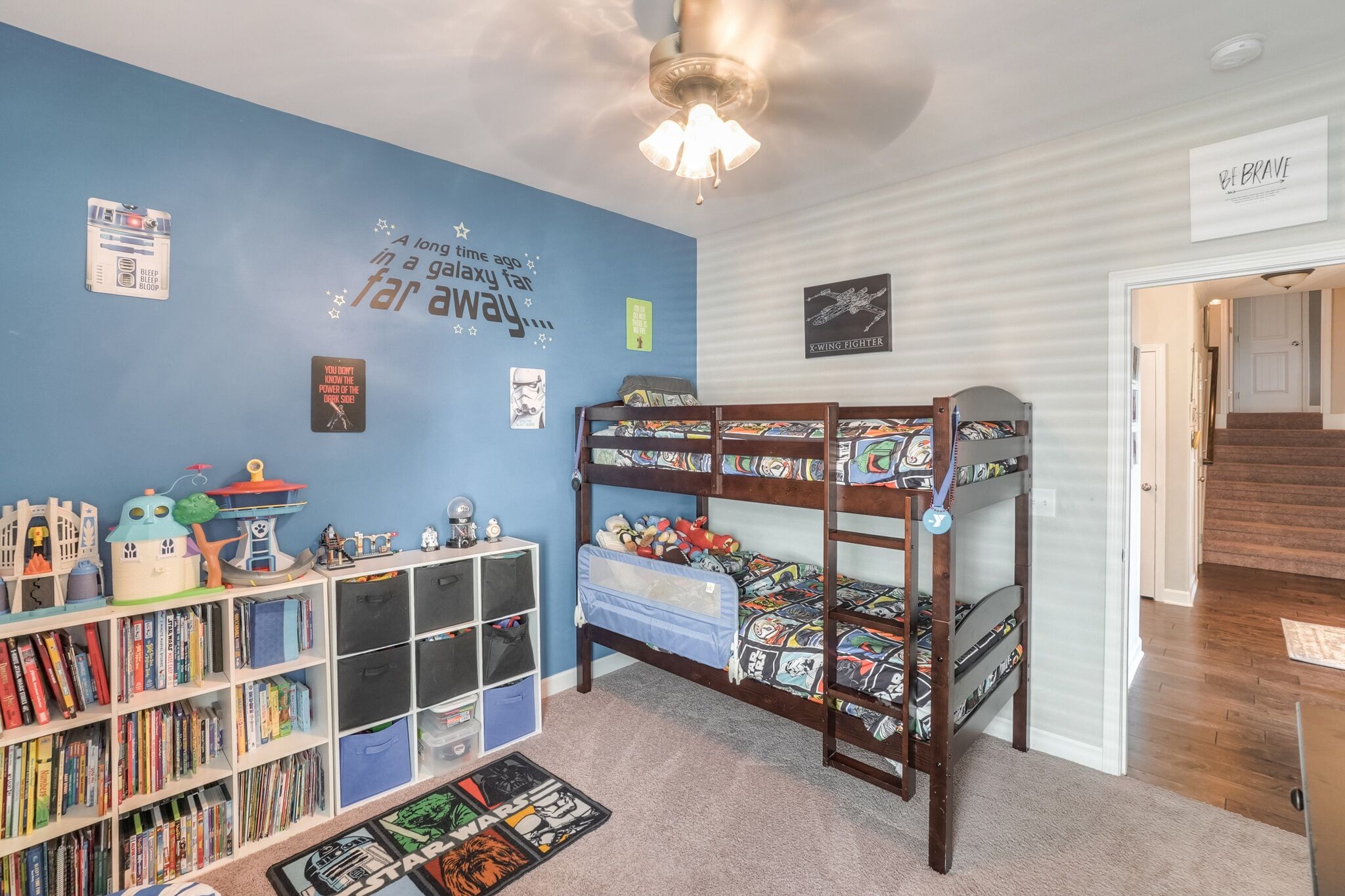 1057 Golf View Way Spring Hill, TN 37174 - Photo 21 of 29 a bedroom with furniture and a book shelf