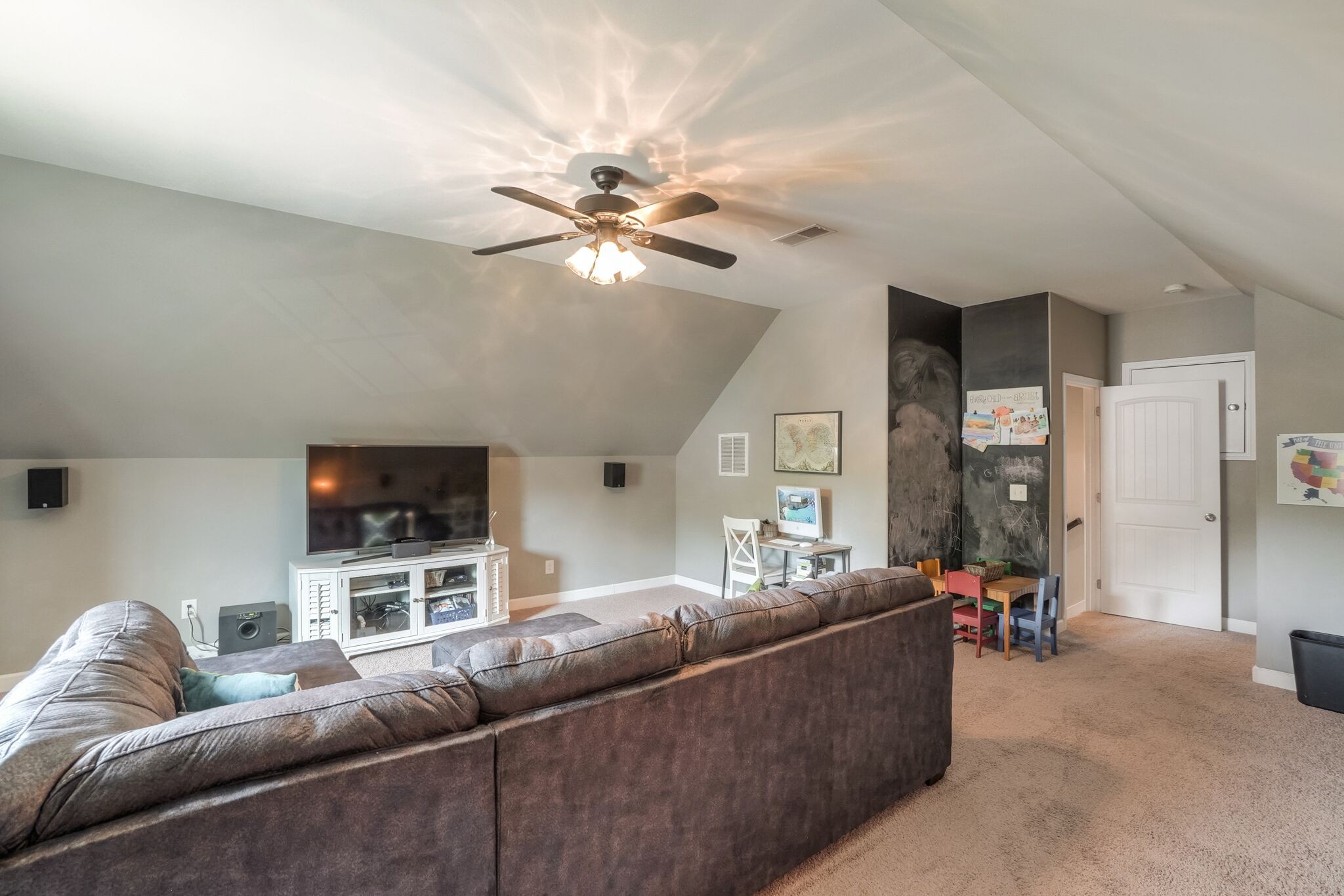 1057 Golf View Way Spring Hill, TN 37174 - Photo 26 of 29 a living room with furniture and a flat screen tv