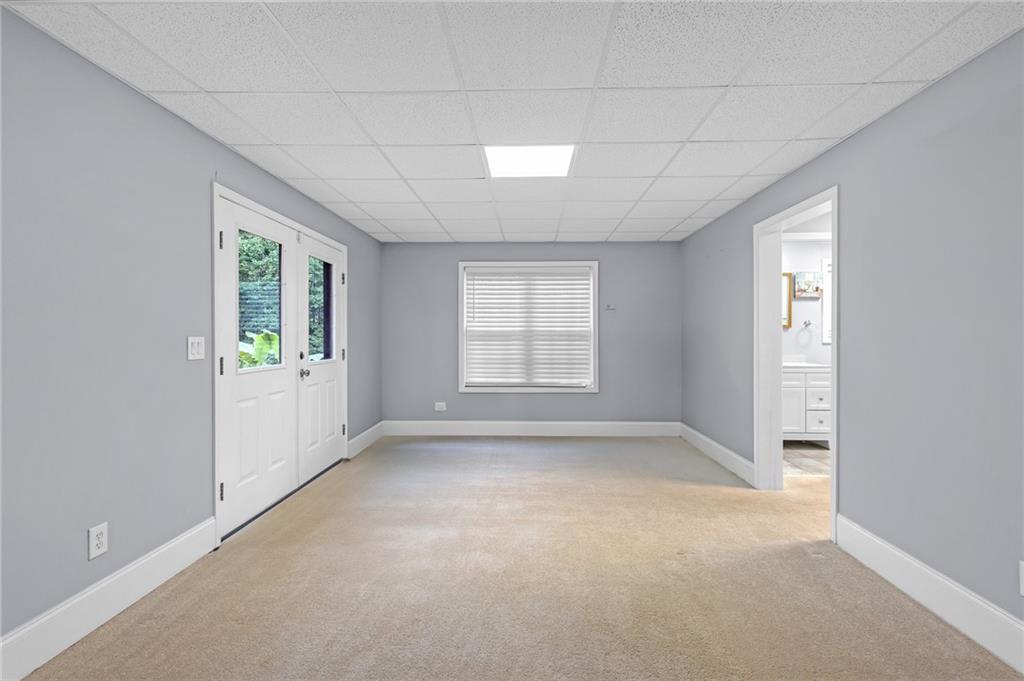 151 Dumar Lane Hoschton, GA 30548 - Photo 47 of 69 a view of an empty room with a window