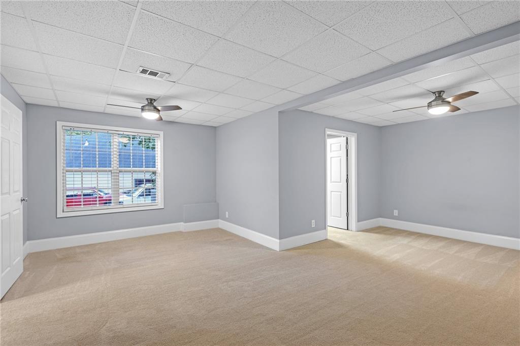 151 Dumar Lane Hoschton, GA 30548 - Photo 53 of 69 an empty room with windows