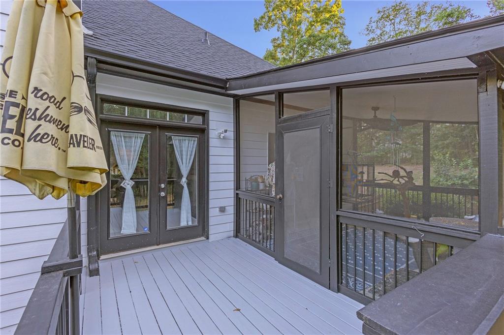 151 Dumar Lane Hoschton, GA 30548 - Photo 58 of 69 a view of a house with a glass door