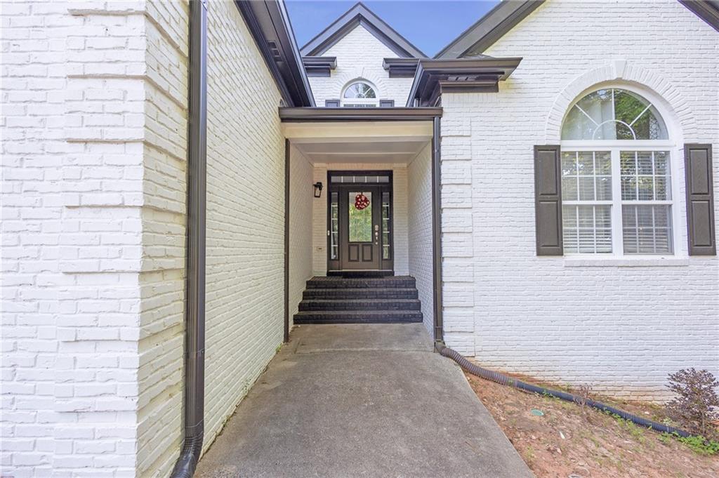 151 Dumar Lane Hoschton, GA 30548 - Photo 8 of 69 a view of front door of house with stairs