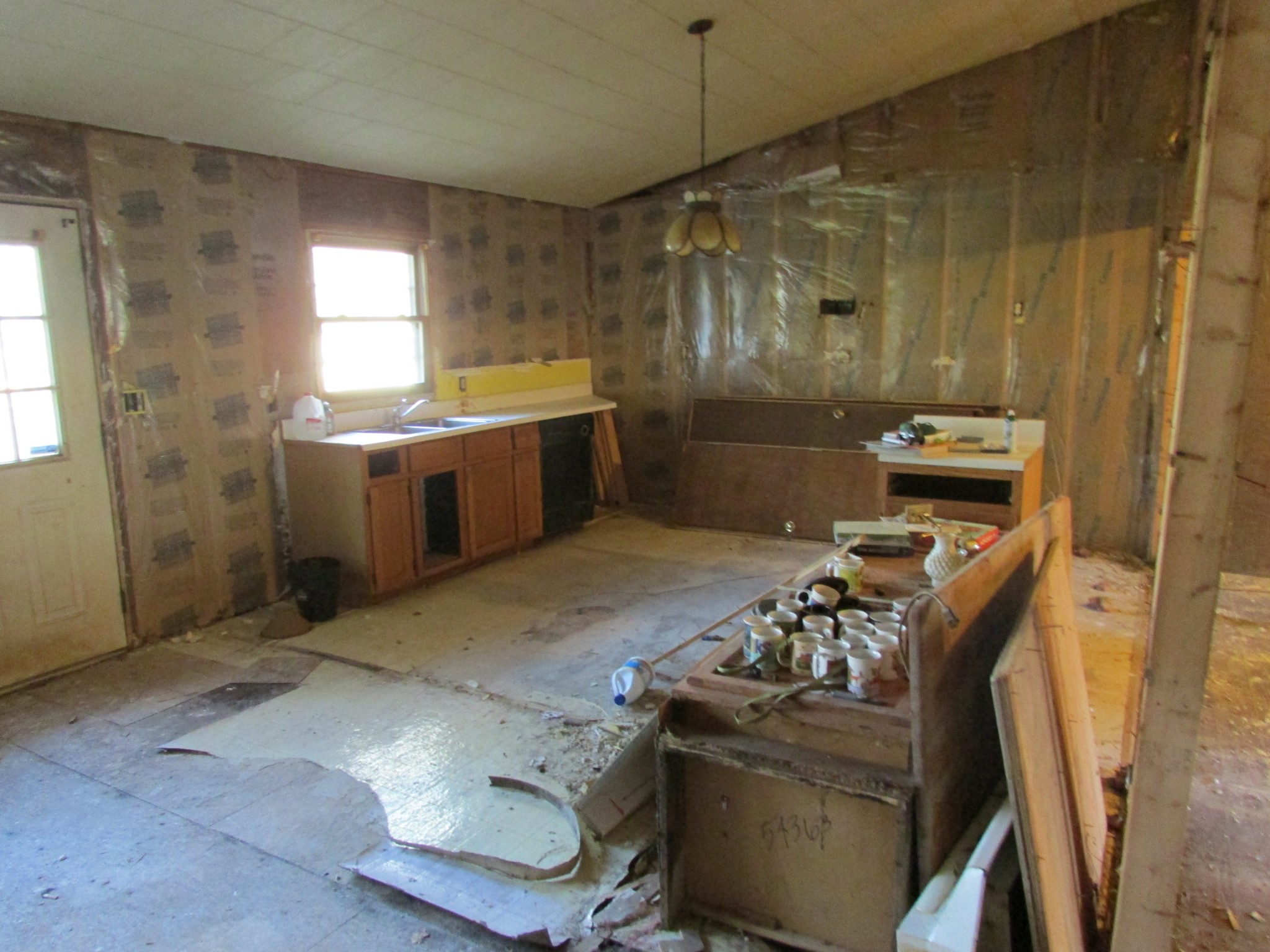 111 Howard Carr Road Manchester, TN 37355 - Photo 4 of 21 a kitchen with a sink and a stove top oven