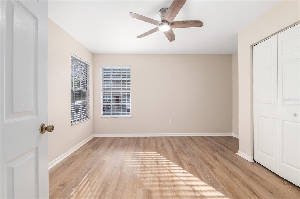 9755 Southwest 52nd Road Gainesville, FL 32608 - Photo 34 of 43 wooden floor in an empty room with a window