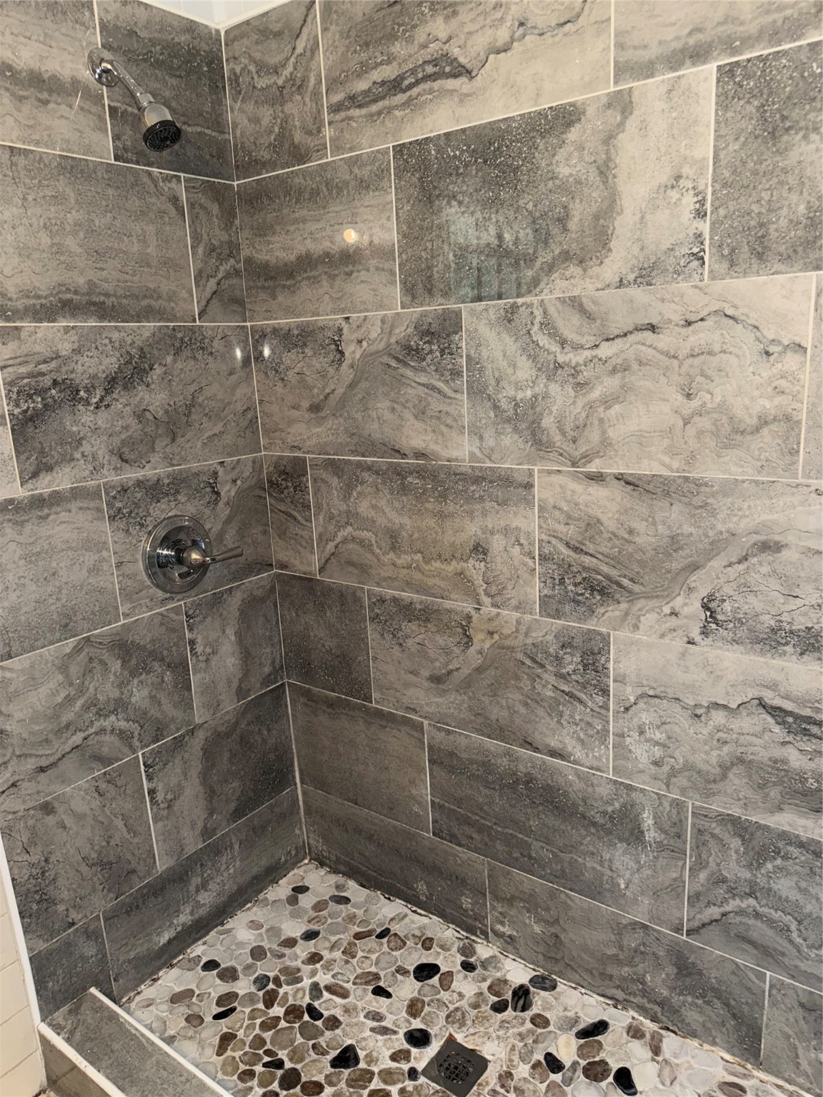 5335 Landry Lane Beaumont, TX 77708 - Photo 11 of 22 UPDATED TILED STEP IN SHOWER.