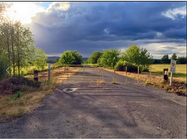 a view of a street with an outdoor space