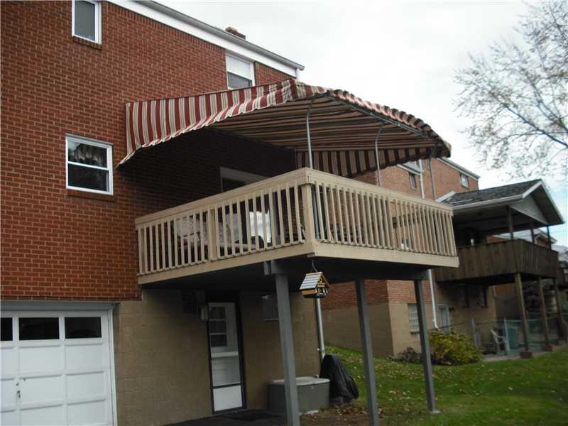 2483 Rose Garden Road Pittsburgh, PA 15220 - Photo 25 of 25 Patio/Deck. Close up view of rear deck showing canvas awning.