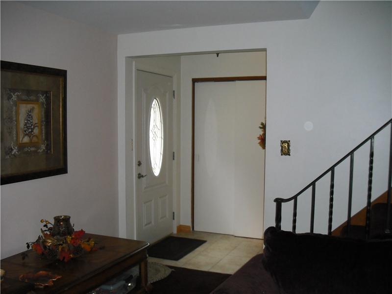 1st Floor Plan. Foyer with ceramic tile floor and newer front entry door.