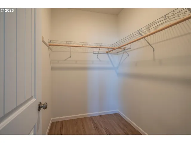 a view of a room with racks on the wall