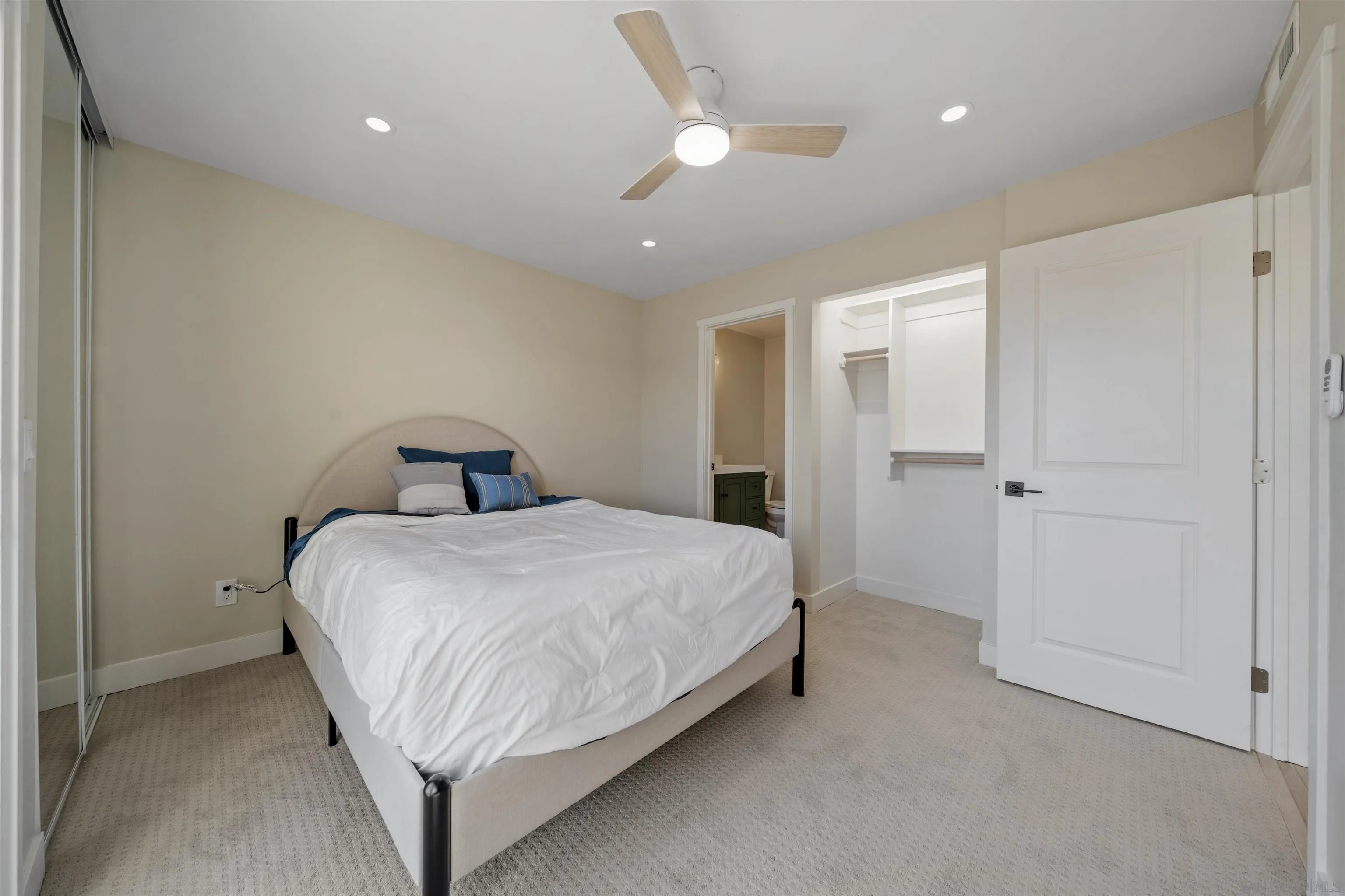 4521 55th Street, Unit 13 San Diego, CA 92115 - Photo 14 of 26 a bedroom with a bed and a ceiling fan