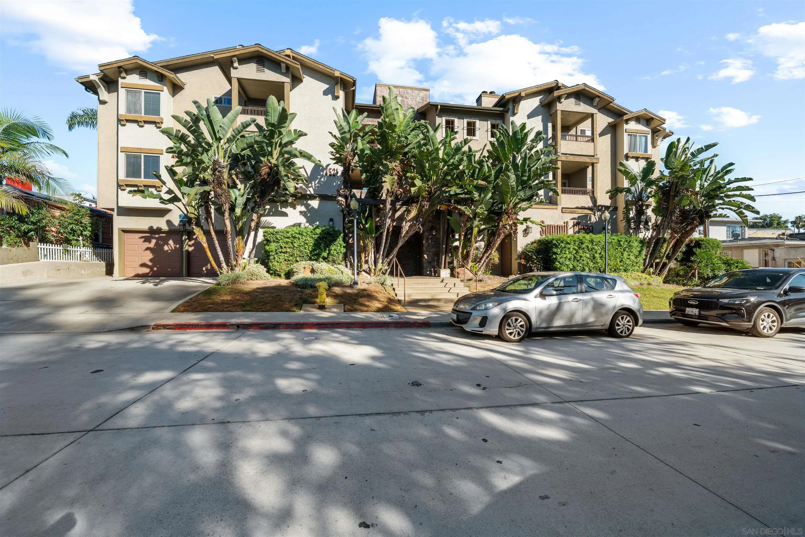 4521 55th Street, Unit 13 San Diego, CA 92115 - Photo 26 of 26 a view of car parked in front of house