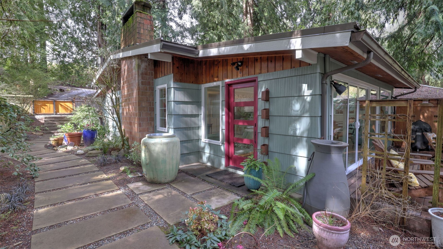 14452 196th Avenue Southeast Renton, WA 98059 - Photo 1 of 1 a view of a small house with potted plants