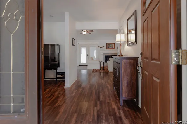 a view of a kitchen from the hallway