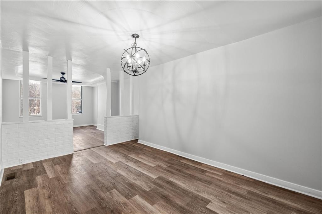 1319 Adams Street Pittsburgh, PA 15233 - Photo 12 of 27 a view of empty room with wooden floor and window