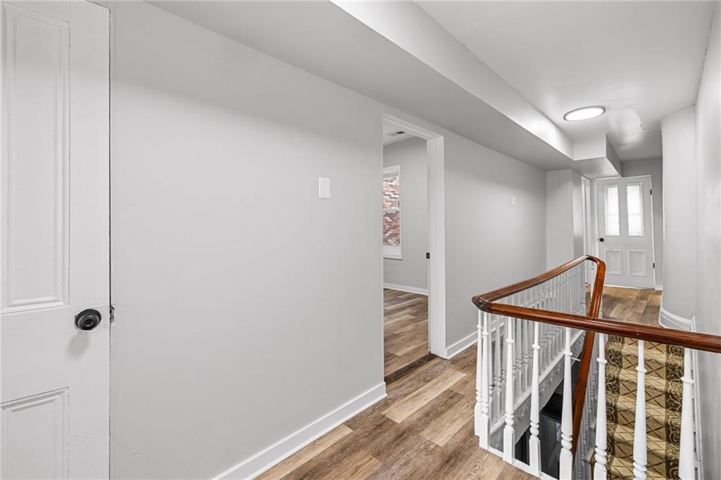 1319 Adams Street Pittsburgh, PA 15233 - Photo 17 of 27 a view of an entryway with wooden floor