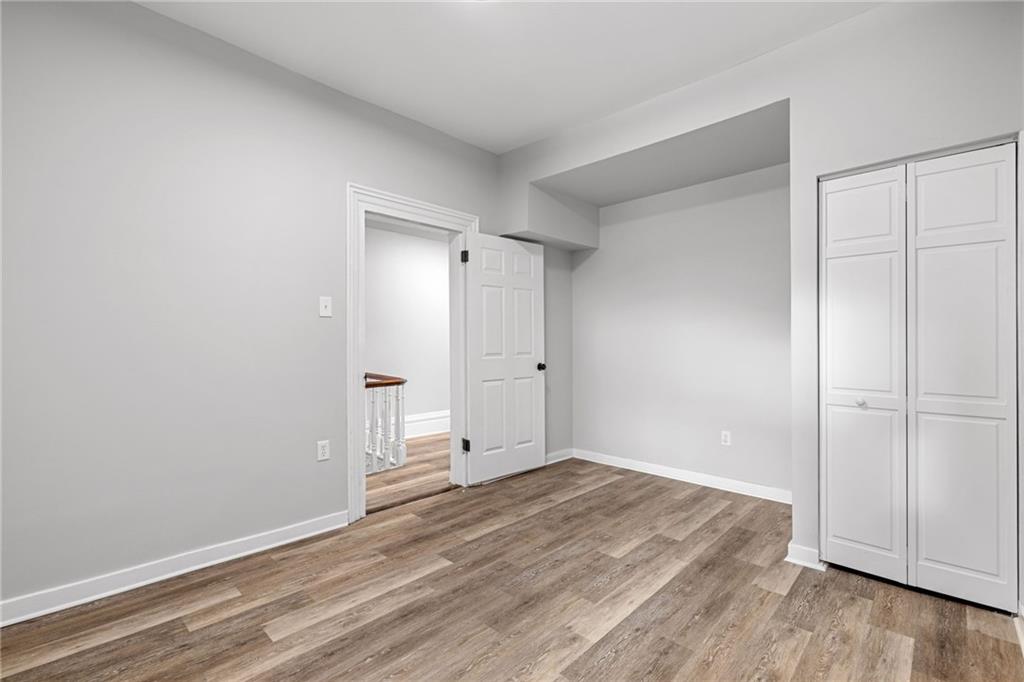 1319 Adams Street Pittsburgh, PA 15233 - Photo 24 of 27 a view of a room with wooden floor