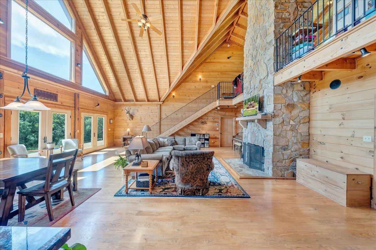 1769 Scenic View Road Moneta, VA 24121 - Photo 16 of 104 a living room with fireplace furniture and a potted plant