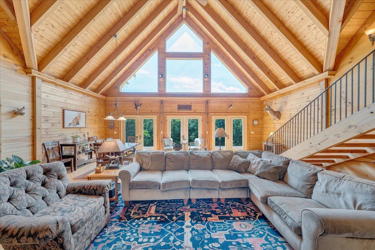 1769 Scenic View Road Moneta, VA 24121 - Photo 17 of 104 a living room with furniture and a large window