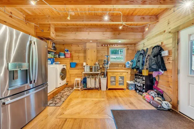 a spacious bathroom with a granite countertop tub sink and mirror