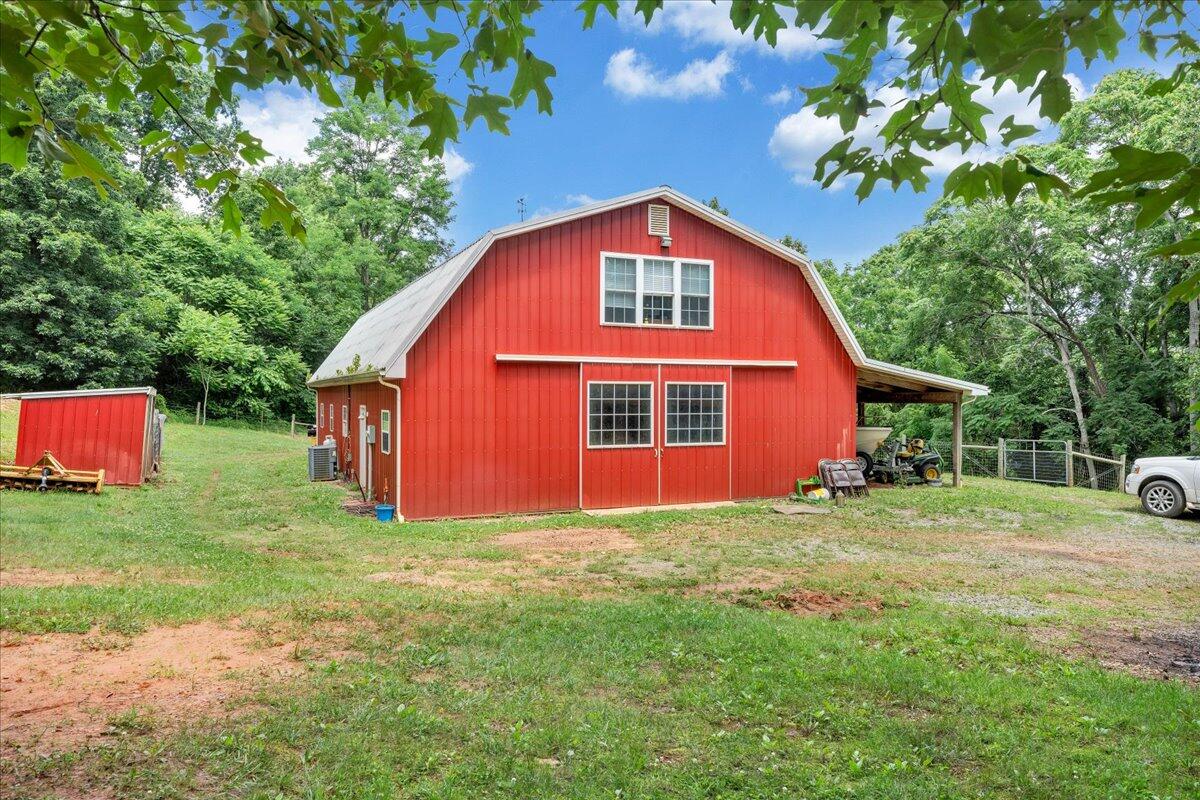 1769 Scenic View Road Moneta, VA 24121 - Photo 60 of 104 a view of a backyard with a garden