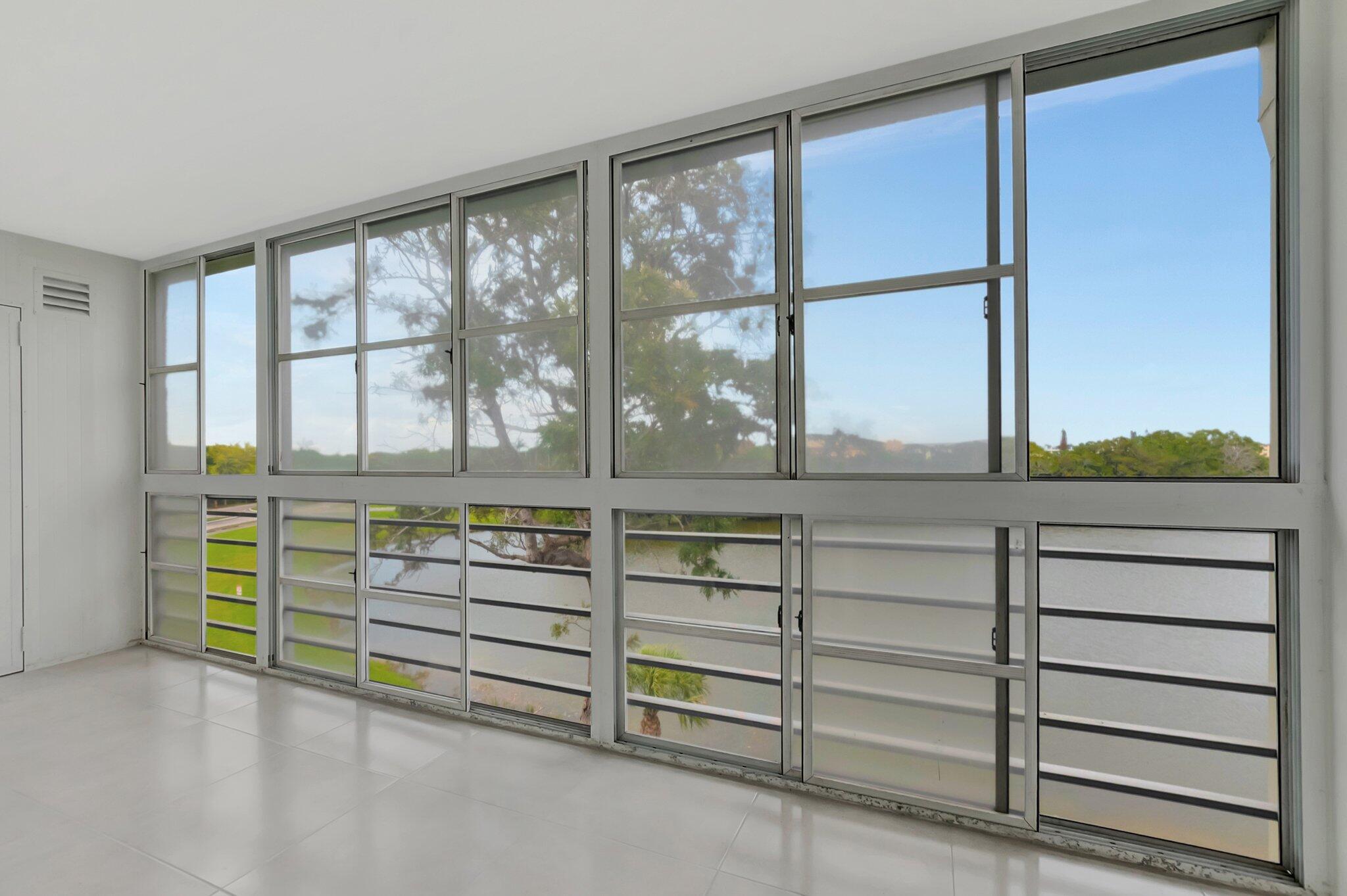 4068 Ainslie Drive, Unit 406 Boca Raton, FL 33434 - Photo 17 of 25 ENCLOSED PATIO