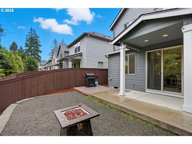 a view of backyard with cabin