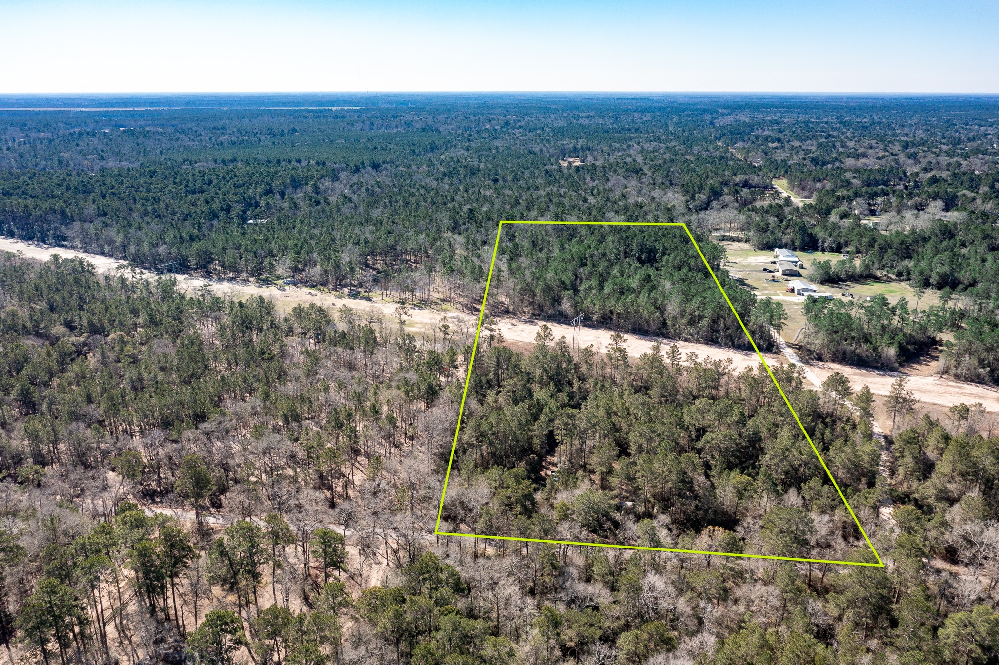 651 Jayhawker Road Cleveland, TX 77328 - Photo 13 of 15 View from front of the property - lot lines approximate