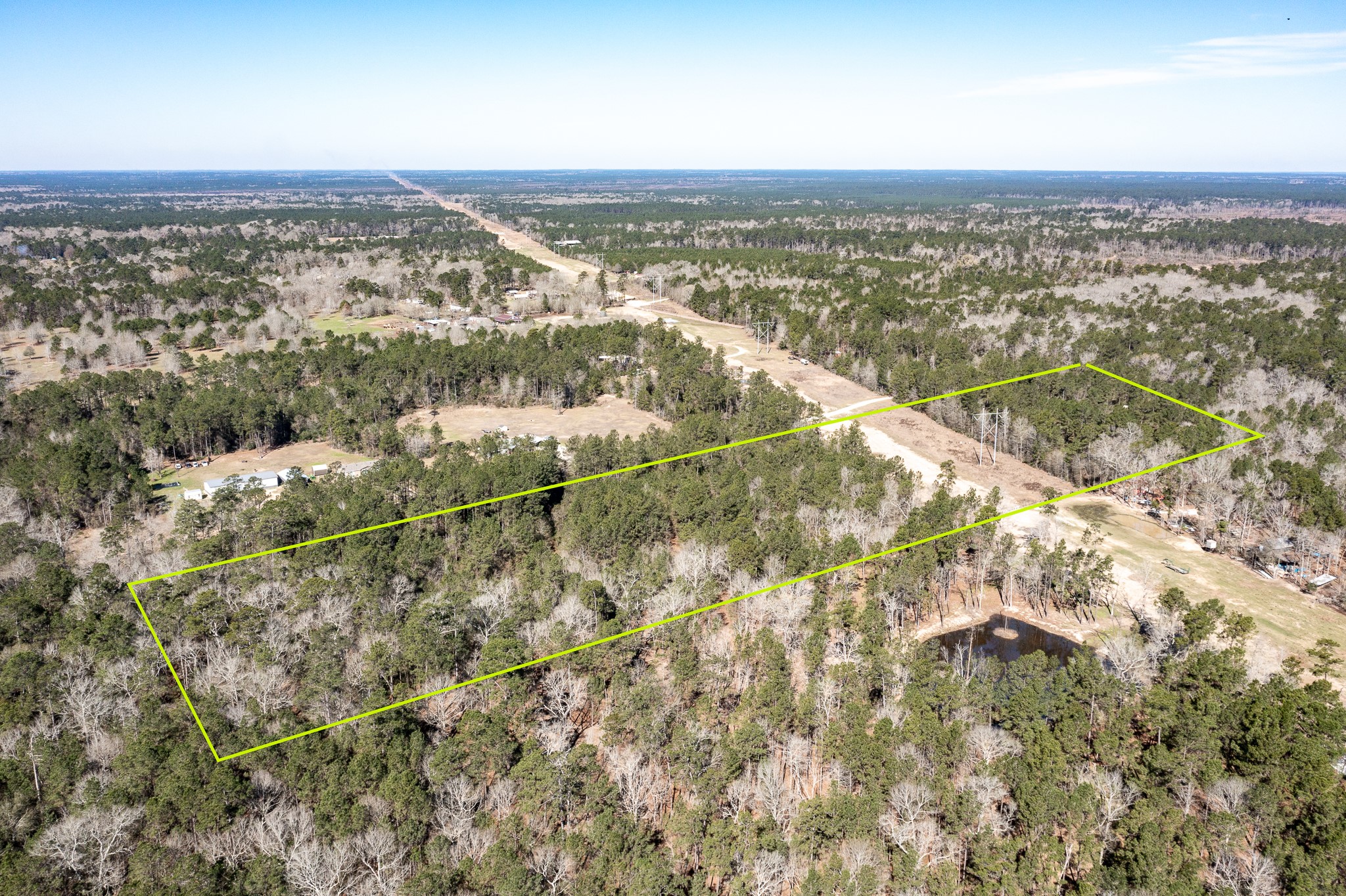 651 Jayhawker Road Cleveland, TX 77328 - Photo 2 of 15 View froom side of the property - lot lines approximate