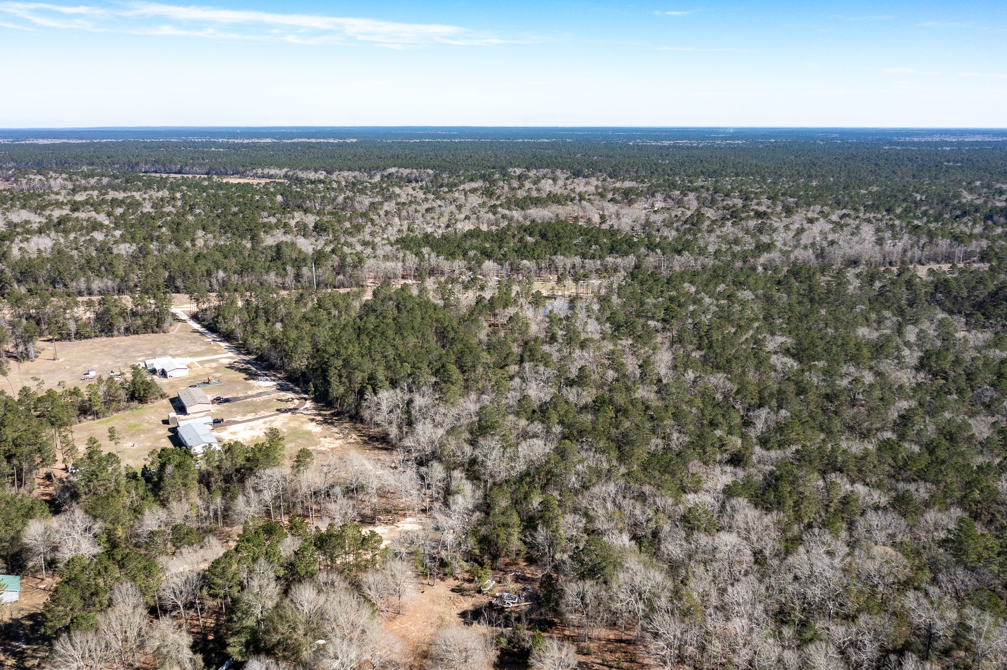 651 Jayhawker Road Cleveland, TX 77328 - Photo 10 of 15 View from the side of the property