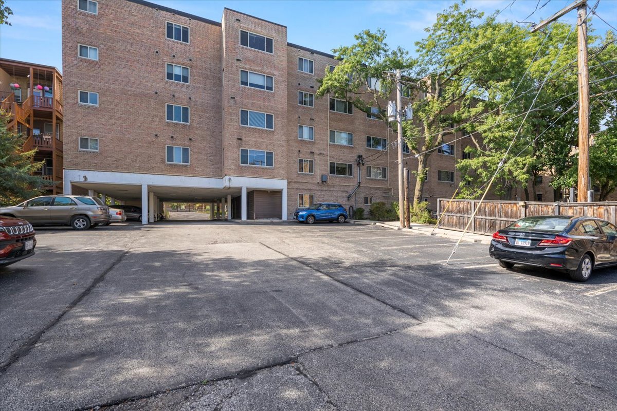 835 Ridge Avenue, Unit 207 Evanston, IL 60202 - Photo 16 of 18 a view of street with parked cars