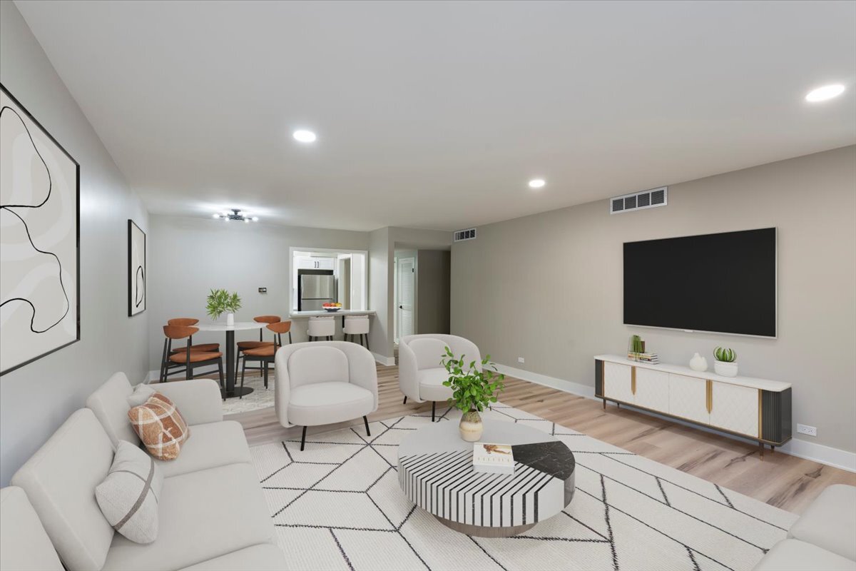 835 Ridge Avenue, Unit 207 Evanston, IL 60202 - Photo 2 of 18 a living room with furniture and a flat screen tv