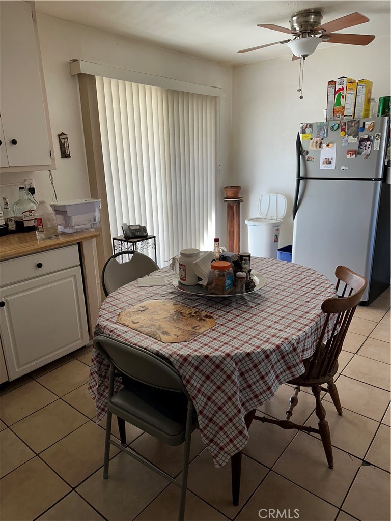 21413 Ottawa Road Apple Valley, CA 92308 - Photo 9 of 9 Kitchen with slider open to rear patio