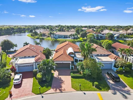 a aerial view of a house with a big yard
