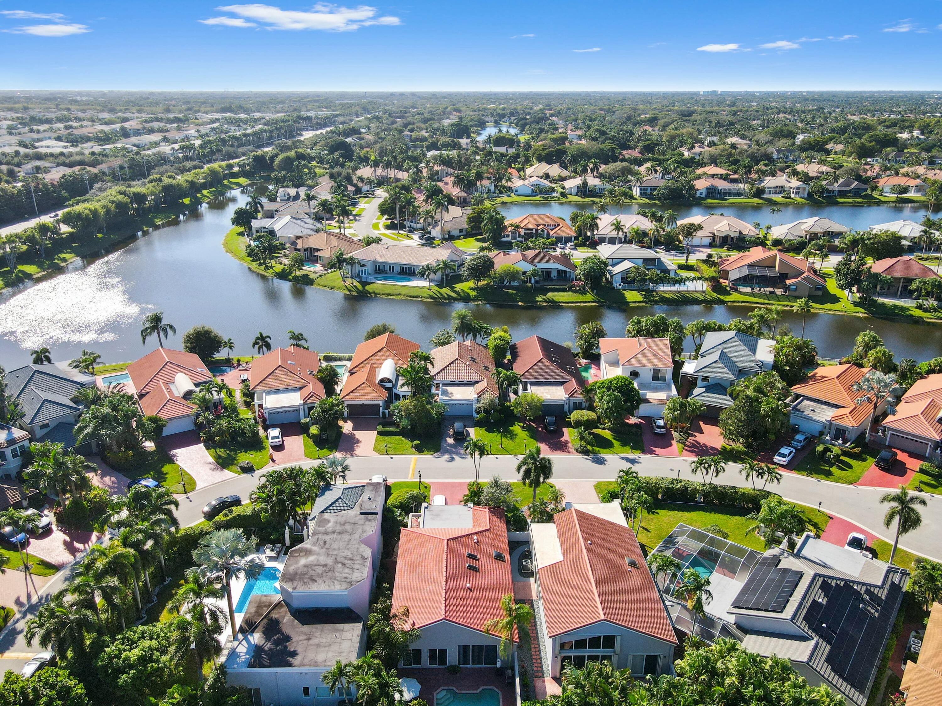 17272 Hampton Boulevard Boca Raton, FL 33496 - Photo 31 of 33 an aerial view of a houses with a lake view