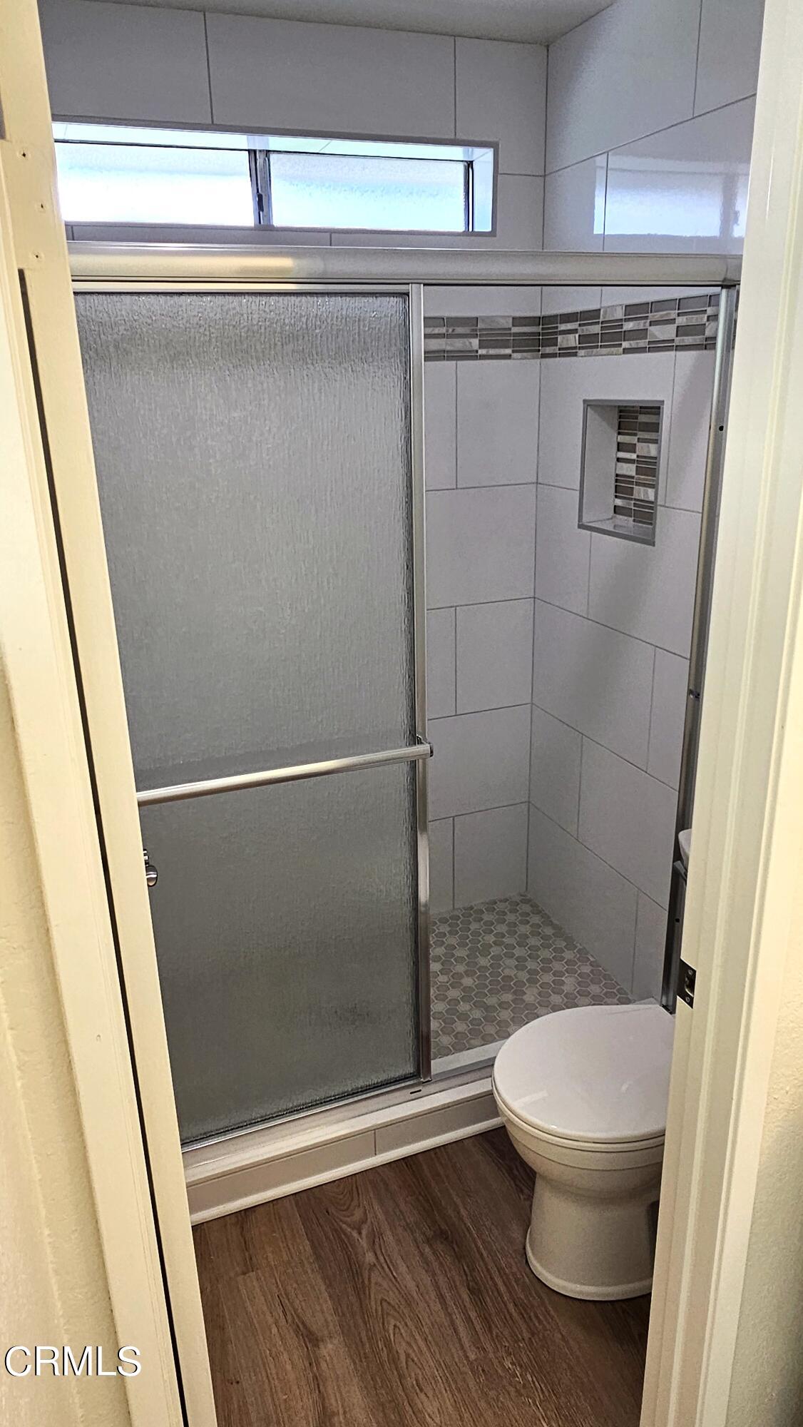 Undisclosed Address Oxnard, CA 93036 - Photo 14 of 22 a bathroom with a toilet and a shower