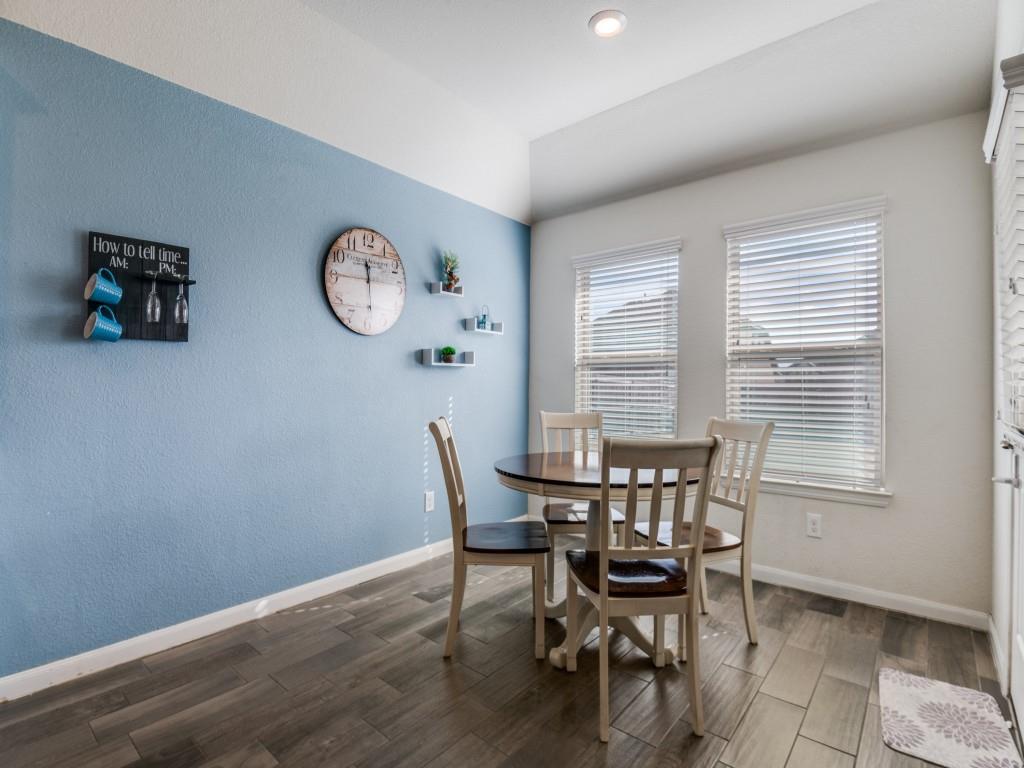 115 Garner Court Forney, TX 75126 - Photo 13 of 26 a view of a dining room with furniture and a large window