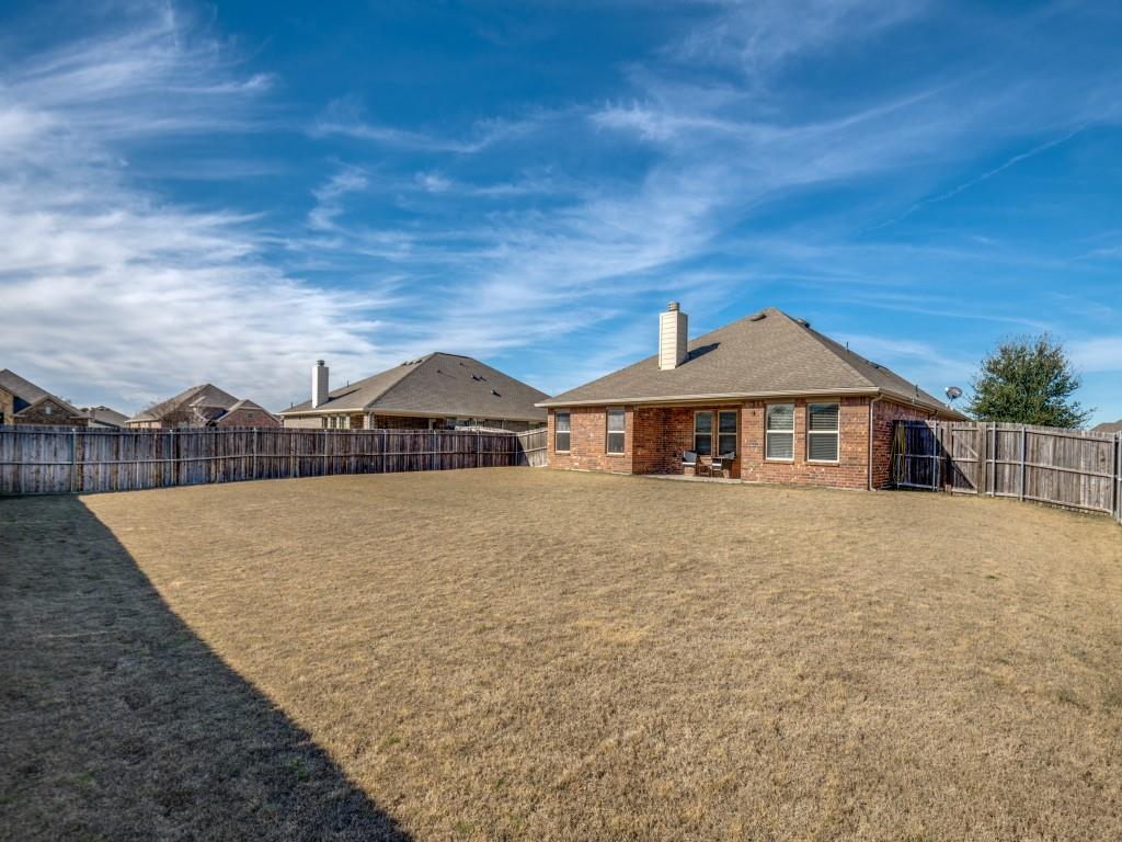 115 Garner Court Forney, TX 75126 - Photo 25 of 26 a front view of a house with a yard