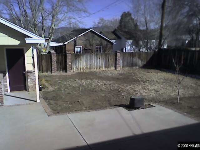 1668 Watt Street Reno, NV 89509 - Photo 9 of 9 a view of a house with a yard