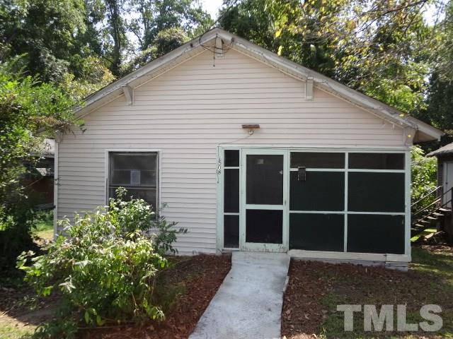 1508 Poole Road Raleigh, NC 27610 - Photo 1 of 8 a view of house with backyard