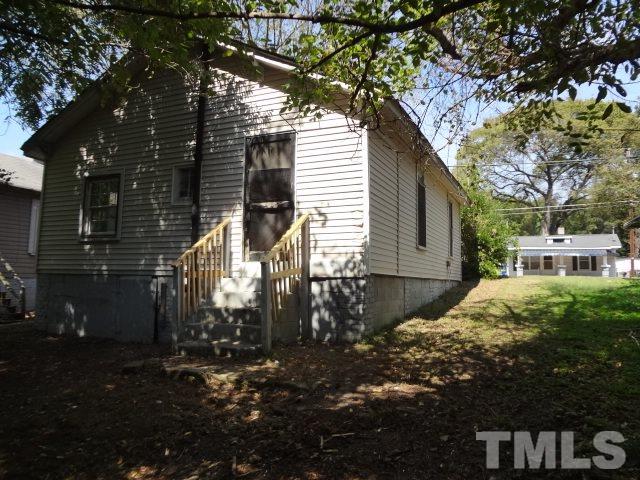 1508 Poole Road Raleigh, NC 27610 - Photo 2 of 8 a view of a house with a yard