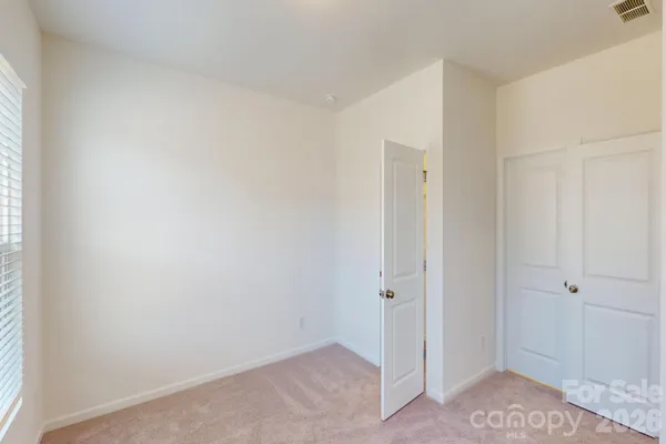 a view of hallway with natural light