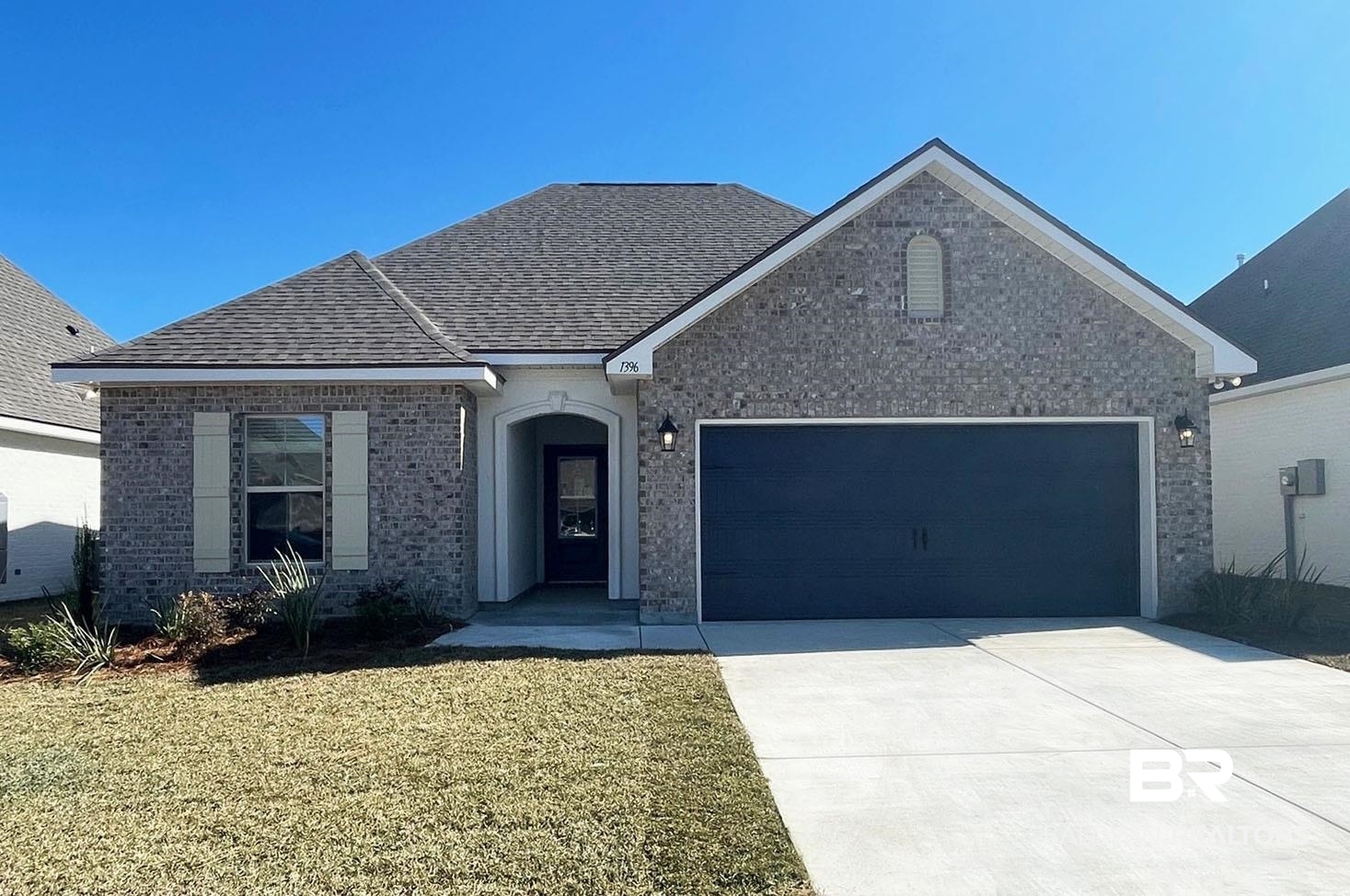 1396 Fenton Circle Foley, AL 36535 - Photo 1 of 14 View of front of property featuring a garage and a front lawn