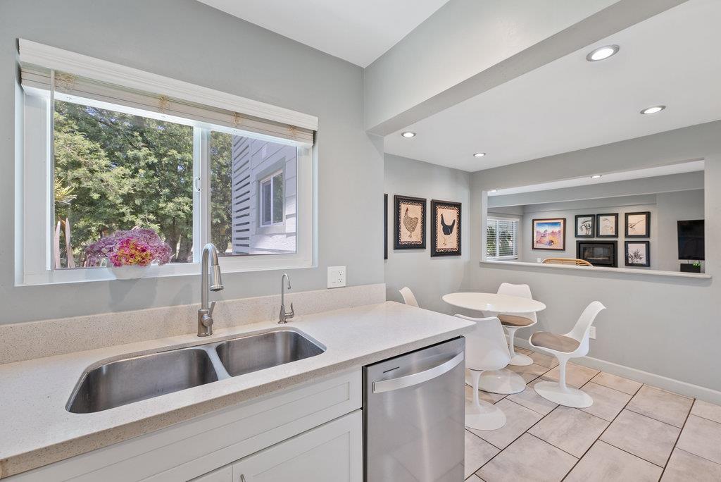 261 Wheelock Road Watsonville, CA 95076 - Photo 17 of 44 a kitchen with a sink cabinets and a window