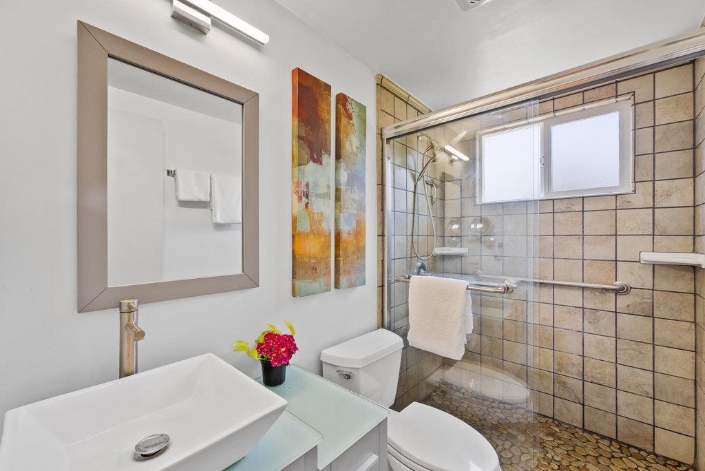 261 Wheelock Road Watsonville, CA 95076 - Photo 20 of 44 a bathroom with a sink toilet and shower